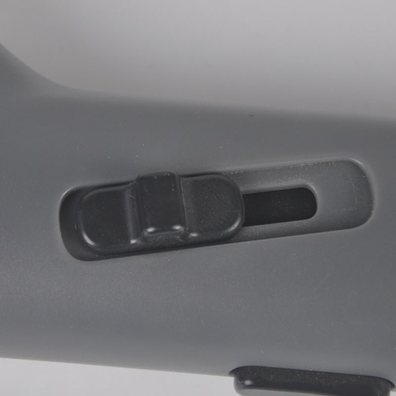 Close-up of the treat launcher's slide trigger