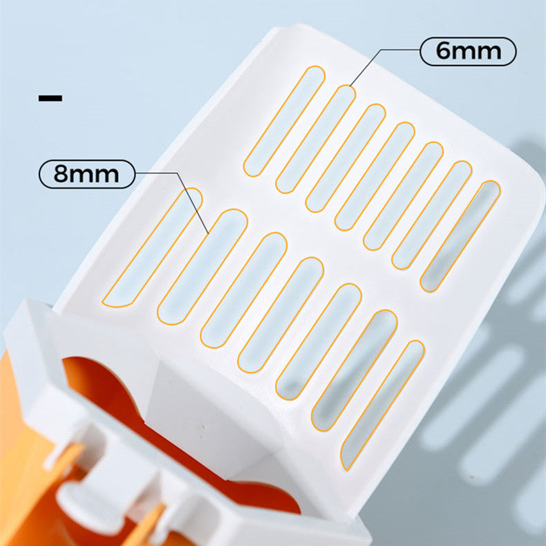 Close-up of the scoop's 6 mm and 8 mm sifting slots