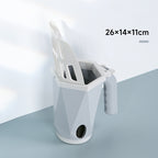 Grey cat litter scoop in its holder