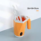 Orange cat litter scoop standing in its holder, 26 x 14 x 11 cm