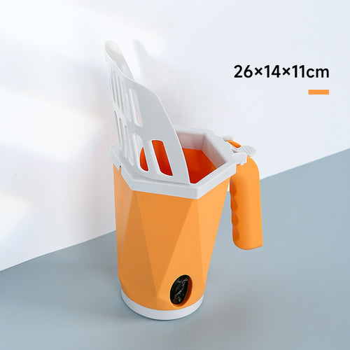 Orange cat litter scoop standing in its holder, 26 x 14 x 11 cm