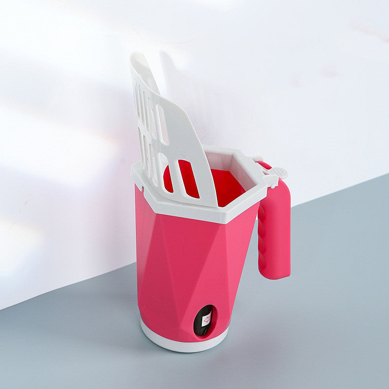 Pink cat litter scoop in its holder